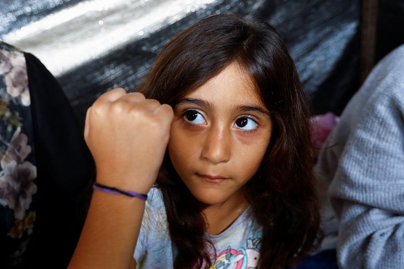 Famílias de Gaza usam pulseiras de identificação para evitar enterro em valas comuns